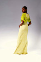 Load image into Gallery viewer, Hand smocked crisscross sleeve with a textured patterned fabric