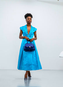 Blue dress.
Blue smocked dress.
Midi dress